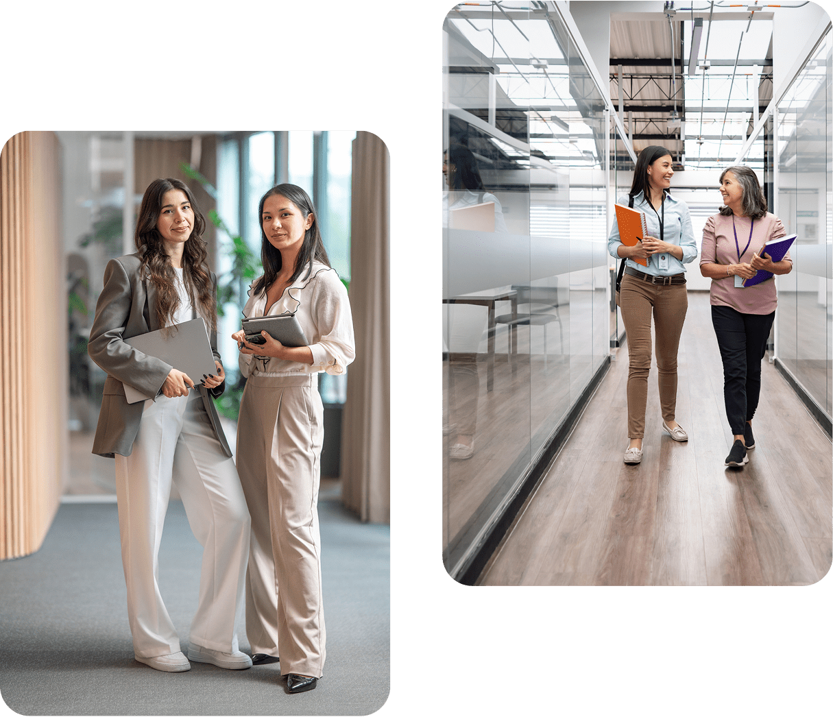 Two women in business attire with laptops
