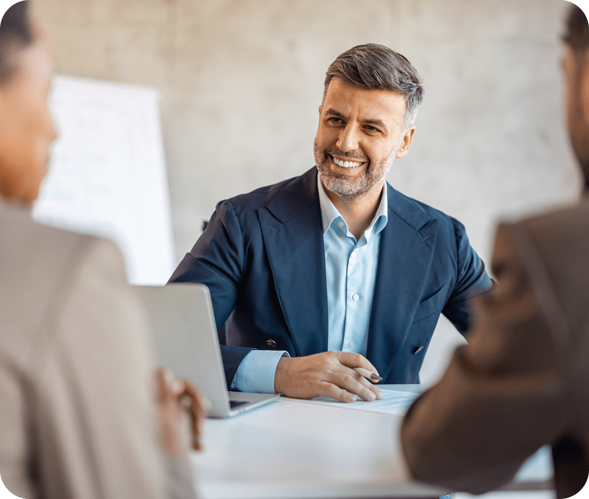 Business meeting with smiling man in suit