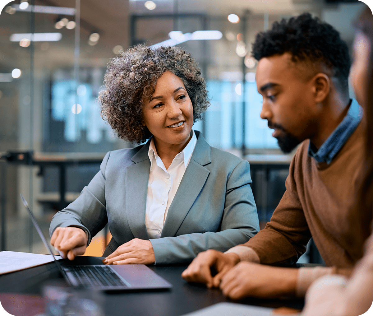 Professionals reviewing work together